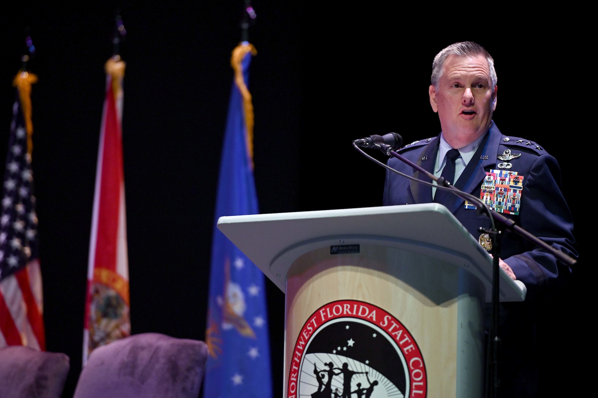 U.S. Air Force Lt. Gen. Brad Webb, commander of Air and Education Training Command, conducts roll-call during the Doolittle Raider Goblet Ceremony at the Mattie Kelly Arts Center at Northwest Florida State College, Niceville, Florida, April 18, 2022. The ceremony marked the 80th Anniversary of the Doolittle Raid, also known as the Tokyo Raid, which was the first air operation to directly strike the mainland of Japan during World War II. (U.S. Air Force photo by Staff Sgt. Brandon Esau)