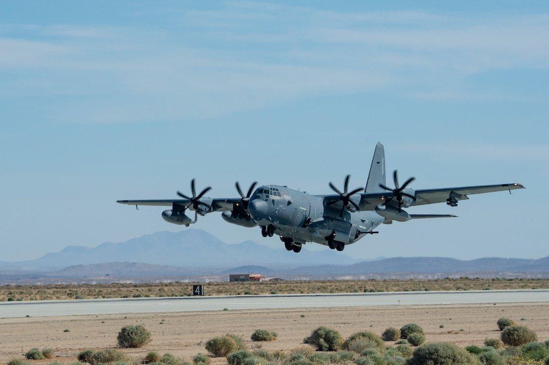 An AC-130J Ghostrider assigned to the 1st Special Operations Wing from Hurlburt Field, Fla., takes off from Edwards Air Force Base, California, April 14. The aircraft recently underwent electronic weapons countermeasures testing at the Benefield Anechoic Facility. (Air Force photo by James West)