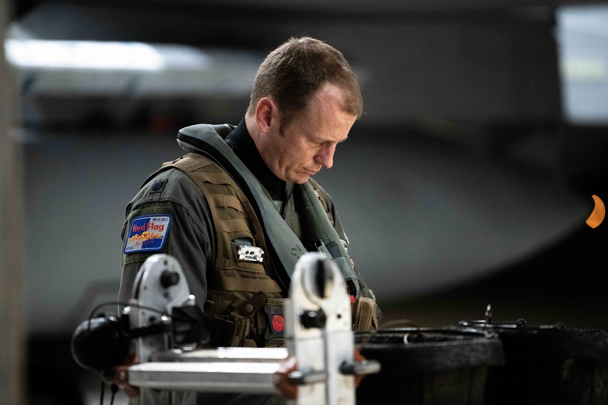 A U.S. Air Force pilot assigned to the 67th Fighter Squadron reviews flight plans for Red Flag-Alaska at Kadena Air Base, Japan, April 15, 2022. Red Flag-Alaska is a Pacific Air Forces-directed field training exercise for U.S. and international forces flown under simulated air combat conditions primarily out of Eielson Air Force Base and Joint Base Elmendorf-Richardson, Alaska. (U.S. Air Force photo by Airman 1st Class Sebastian Romawac)