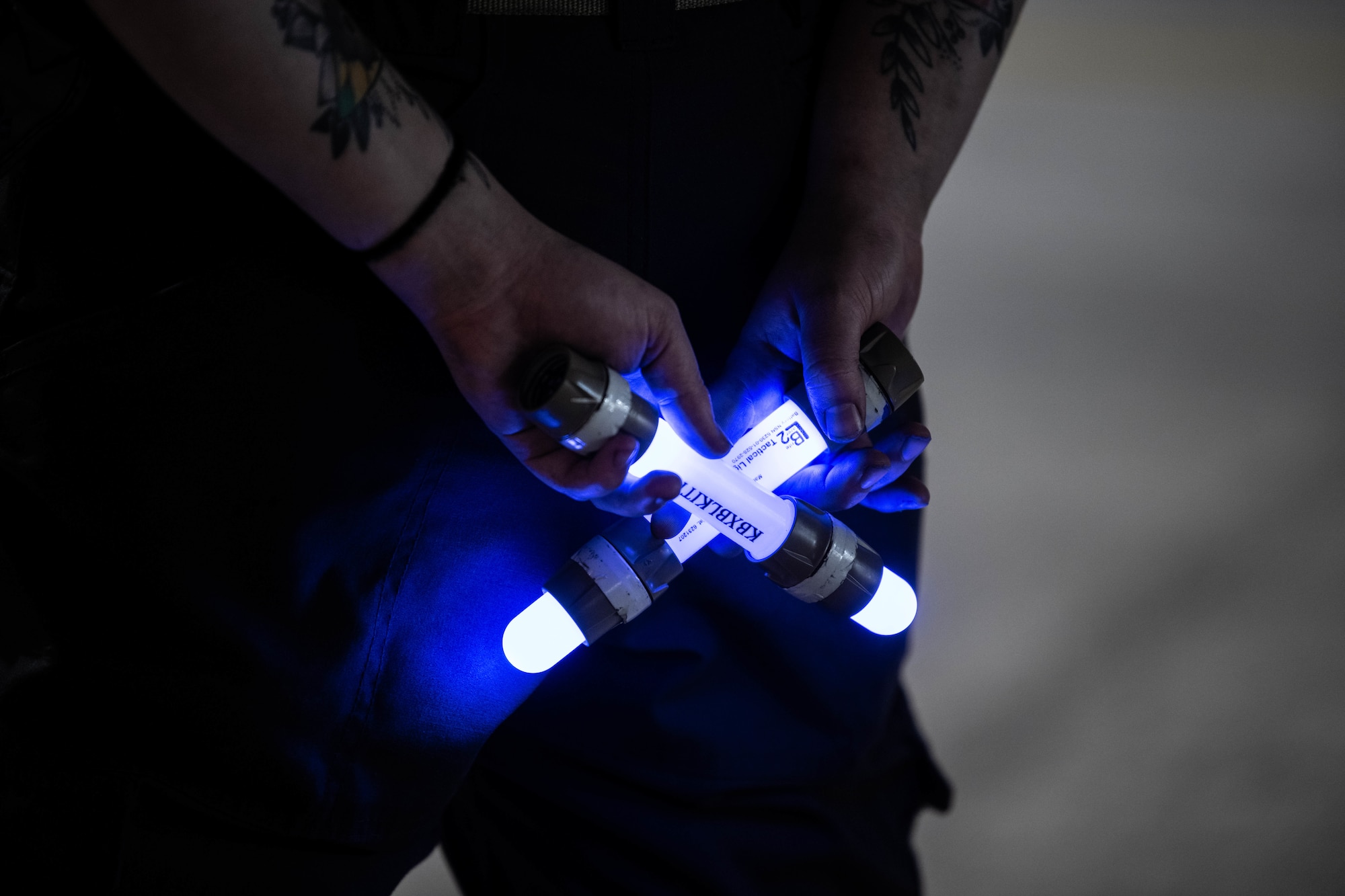 Senior Airman Allyssa Helman, 44th Aircraft Maintenance Unit crew chief, prepares to marshal an F-15C Eagle onto the flightline for Red Flag-Alaska at Kadena Air Base, Japan, April 15, 2022. In addition to aircrew, Red Flag-Alaska provides training for deployed maintenance and support personnel in sustainment of large-force deployed air operations. (U.S. Air Force photo by Airman 1st Class Sebastian Romawac)