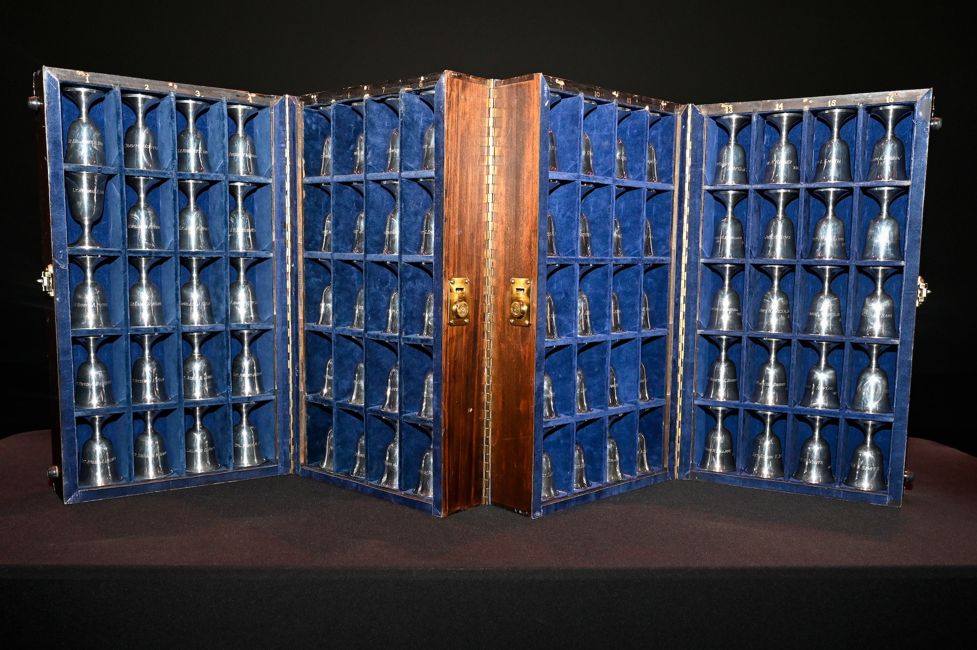 Engraved silver goblets that represent each of the Doolittle Raiders are displayed before a ceremony commemorating them in Fort Walton Beach, Fla., April 18. 2022.