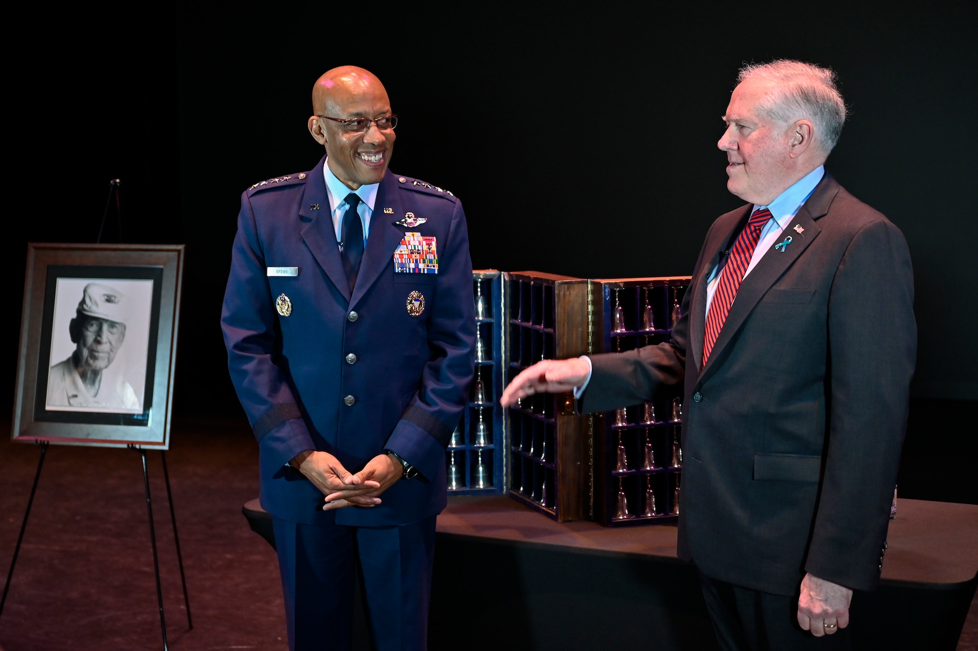 Secretary of the Air Force Frank Kendall, right, and Air Force Chief of Staff Gen. CQ Brown, Jr. give an interview before a ceremony commemorating the Doolittle Raiders in Fort Walton Beach, Fla., April 18. 2022.
