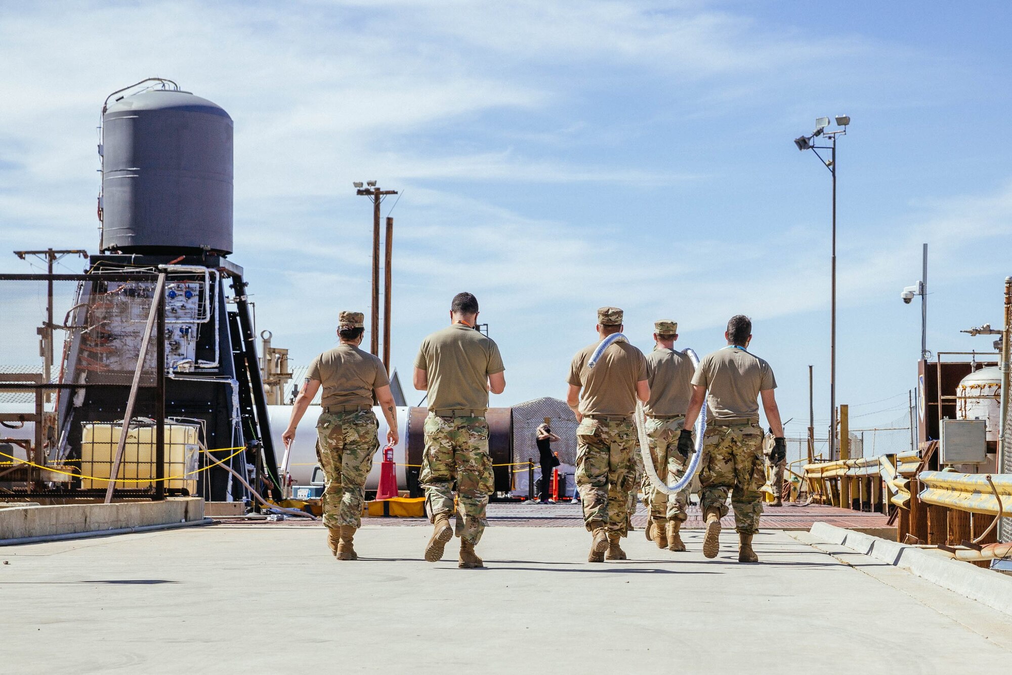 In 2021, The Air Force Research Laboratory and ABL Space Systems partnered with operators from the 2nd Space Launch Squadron and 412th Test Wing at Edwards Air Force Base, California to demonstrate how launch systems can be operated rapidly by small teams from nontraditional sites. AFWERX, part of AFRL, brought together players from across the national security space enterprise for this rapid rocket launch concept of operations demonstration. The complete test campaign, from training to full operations with cryogenic rocket propellants, validated the strong training base and capability of U.S. Air Force and U.S. Space Force active-duty personnel in conducting liquid rocket CONOPS and fielding of novel deployable systems. (Courtesy photo / ABL Space Systems)