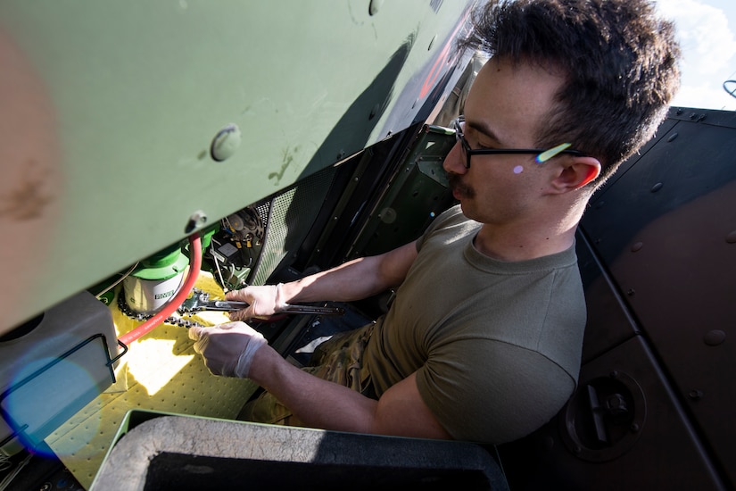 An airman works on maintenance
