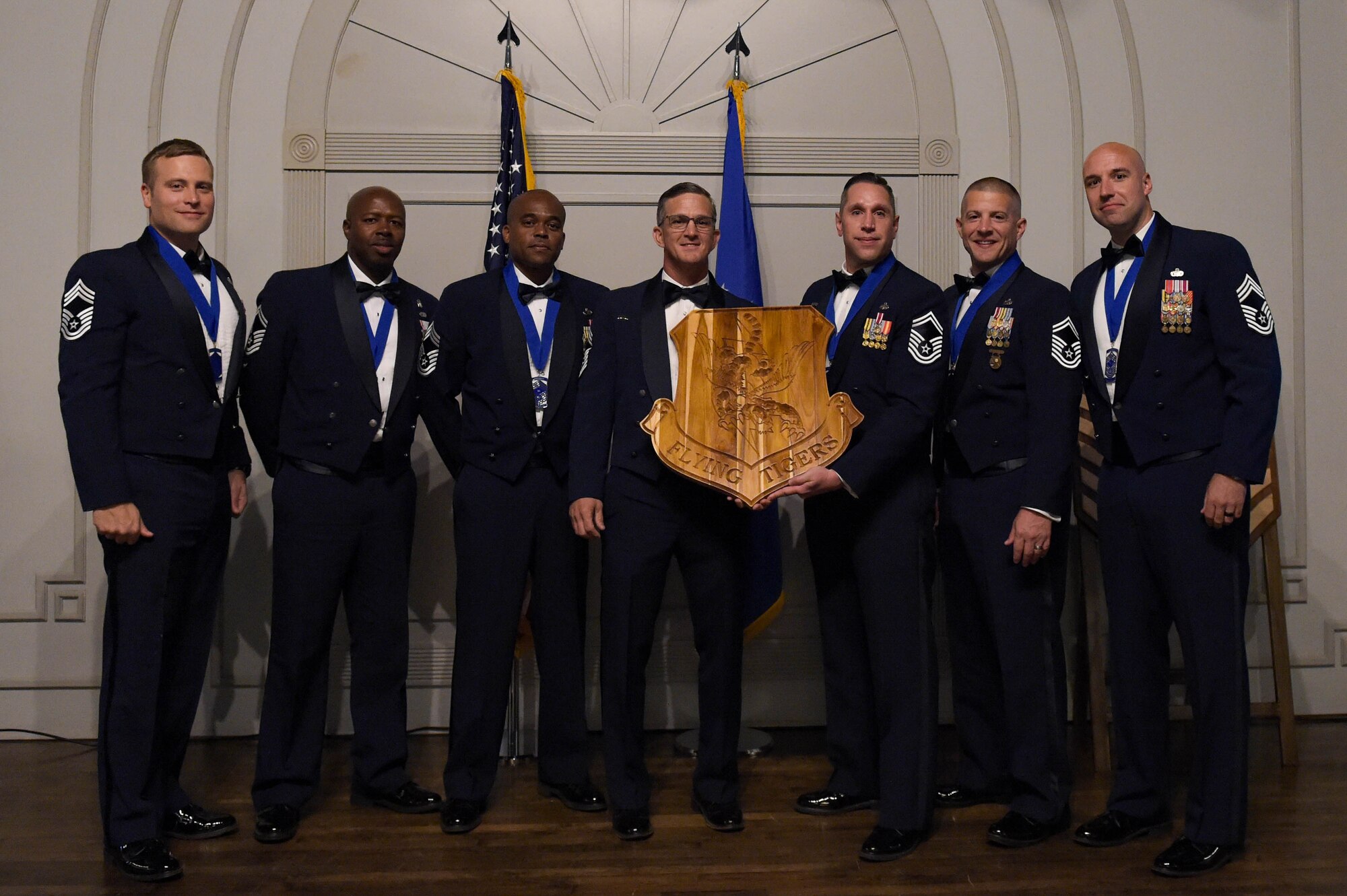 A photo of Airmen posing.