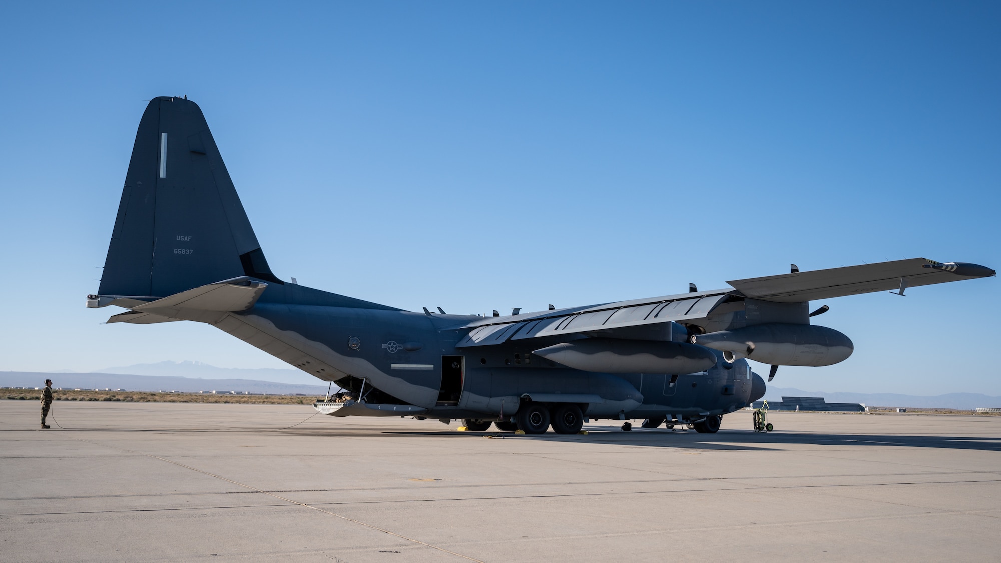 An AC-130J Ghostrider assigned to the 1st Special Operations Wing from Hurlburt Field, Fla., prepares to depart Edwards Air Force Base, California, April 14. The aircraft recently underwent electronic weapons countermeasures testing at the Benefield Anechoic Facility. (Air Force photo by Giancarlo Casem)
