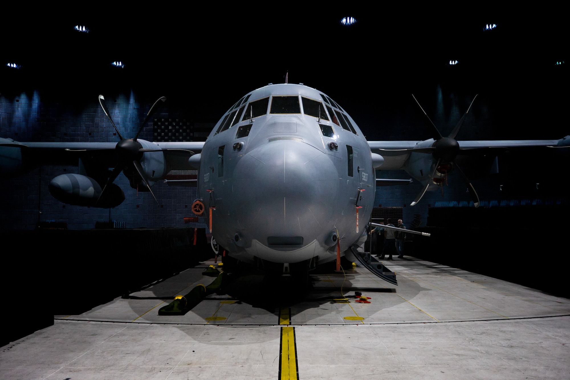 An AC-130J Ghostrider assigned to the 1st Special Operations Wing from Hurlburt Field, Fla., is loaded into the Benefiled Anechoic Facility on Edwards Air Force Base, California, March 17. The aircraft recently underwent electronic weapons countermeasures testing at the BAF. (Air Force photo by Adam Bowles)