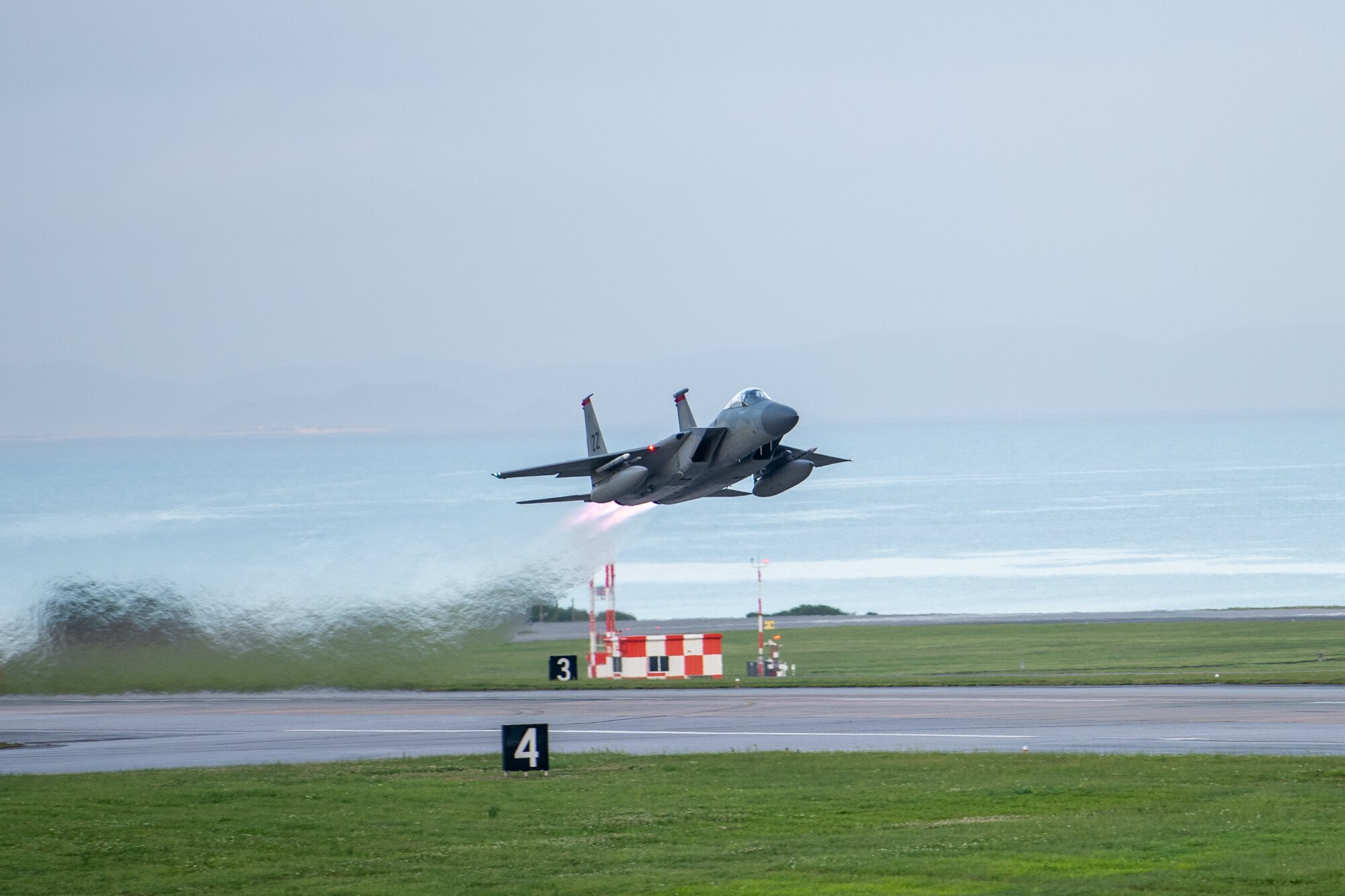 An F-15C Eagle assigned to the 67th Fighter Squadron takes off for Red Flag-Alaska at Kadena Air Base, Japan, April 15, 2022. Red Flag-Alaska is a Pacific Air Forces-directed field training exercise for U.S. and international forces flown under simulated air combat conditions primarily out of Eielson Air Force Base and Joint Base Elmendorf-Richardson, Alaska. (U.S. Air Force photo by Airman 1st Class Sebastian Romawac)