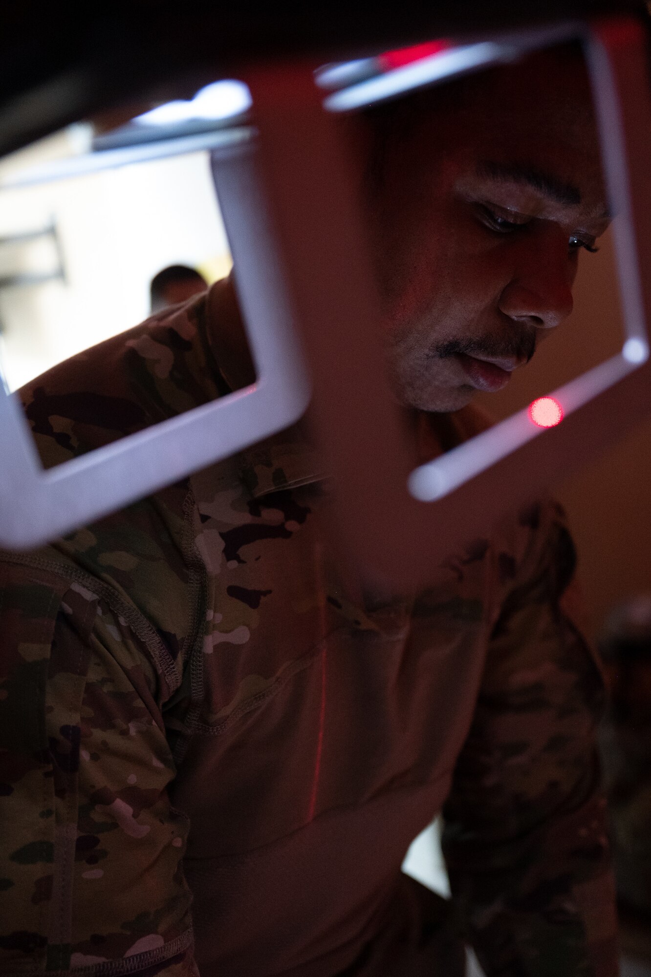 U.S. Air Force Senior Airman Tommy D. Jones, 332d Expeditionary Medical Group laboratory technician, prepares the x-ray room for a patient at an undisclosed location in Southwest Asia, April 9, 2022. Jones is the 332d EMDG’s only laboratory technician and is one of many multi-capable Airmen within the 332d EMDG supporting daily operations. (U.S. Air Force photo by Master Sgt. Christopher Parr)