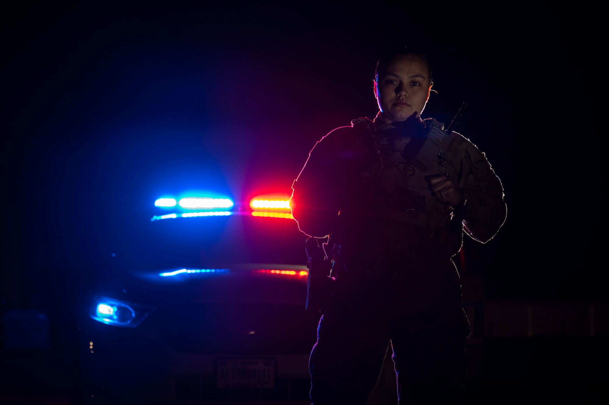 A police officer poses for a photo
