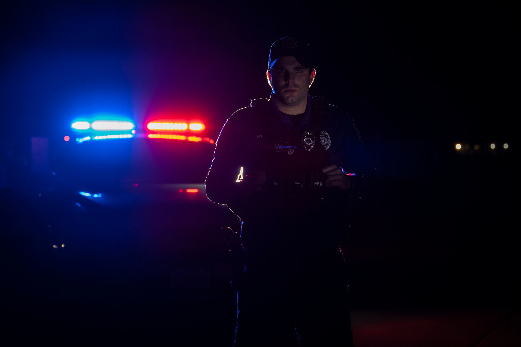 A police officer poses for a photo