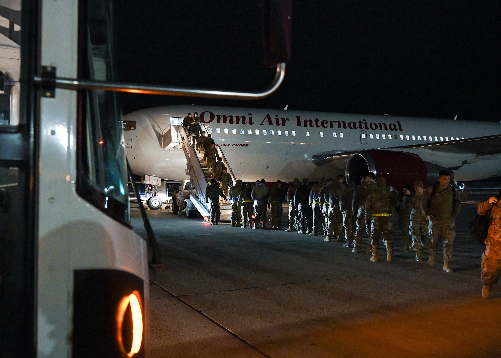 Airmen returning from Winter Break 2022 deployment load on to busses at Minot Air Force Base, North Dakota, April 19, 2022. These Airmen have been overseas for months participating in a BTF, an operation that is conducted with NATO partners and allies to demonstrate and strengthen our shared commitment to global security and stability.
(U.S. Air Force Photo by Airman 1st Evan J. Lichtenhan)