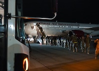 Airmen returning from Winter Break 2022 deployment load on to busses at Minot Air Force Base, North Dakota, April 19, 2022. These Airmen have been overseas for months participating in a BTF, an operation that is conducted with NATO partners and allies to demonstrate and strengthen our shared commitment to global security and stability.
(U.S. Air Force Photo by Airman 1st Evan J. Lichtenhan)