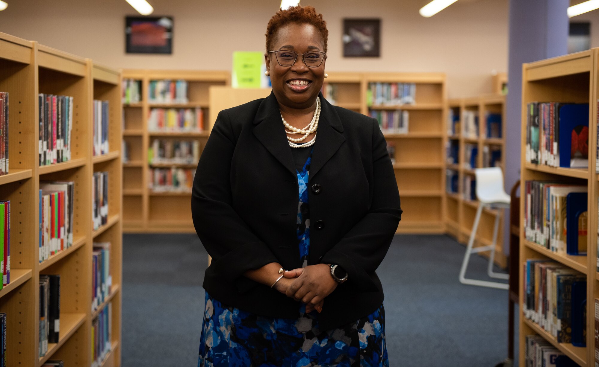 : Christina Fletcher, the first Director of the DOD STARBASE Program at Joint Base MDL, tours the Joint Base MDL Library which will be the home of the new DOD STARBASE classroom. The JB MDL DOD STARBASE will open its doors for the first class of students on May 5.