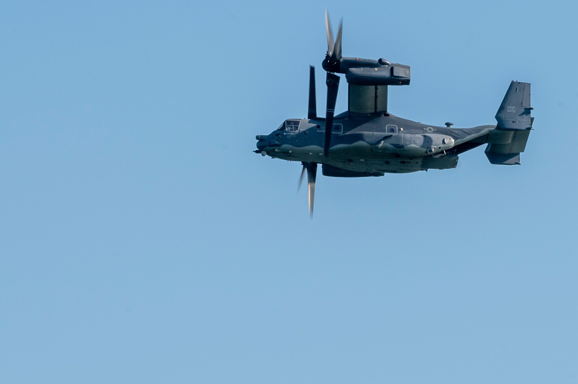 An 8th Special Operations Squadron CV-22 Osprey, assigned to Hurlburt Field, Fla., flies over during The Doolittle Raiders’ 80th Anniversary ceremony, April 18, 2022 at Okaloosa Island. U.S. Air Force Lt. Gen. Jim Slife, commander of Air Force Special Operations Command and U.S. Air Force Lt. Gen. Brad Webb, commander of Air Education and Training Command (AETC), conducted an aerial review in honor of the members of the Doolittle Raiders.