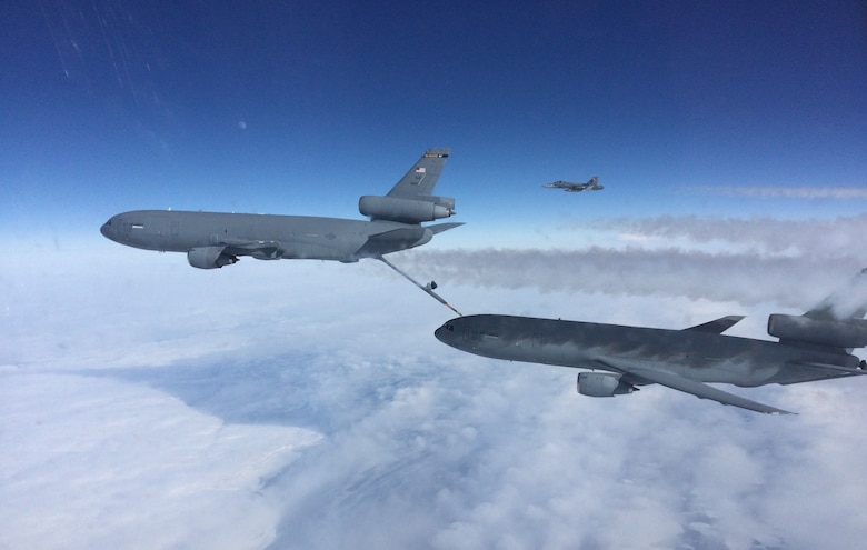 U.S. Air Force KC-10 Tankers conduct air-to-air refueling operations near Thule Air Base, Greenland, March 14, 2022, as part of Operation NOBLE DEFENDER. Our network of allied relationships and capabilities strengthens our collective deterrent against strategic competitors. (Royal Canadian Air Force photo by Master Cpl Steeve Picard)