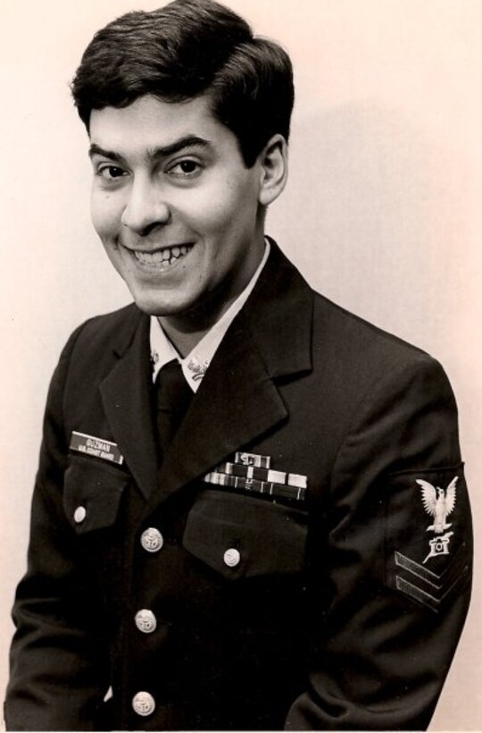 A portrait photo of PA2 John Guzman, USCG, in 1986.