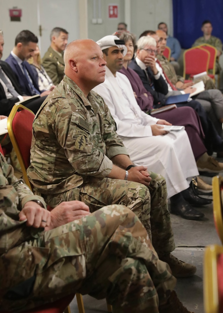 U.S. Army Command Sgt. Maj. Jeremy Lile, the Combined Joint Task Force – Operation Inherent Resolve (CJTF-OIR) Command Sergeant Major, listens intently during the Ambassadors Day event at Union III forward operating base in Baghdad, Iraq, April 21, 2022. During the CJTF-OIR-hosted event, representatives from more than 25 Coalition countries discussed the CJTF-OIR mission and broad efforts to tackle enduring regional security and stability challenges. (U.S. Army photo by Spc. Nathan Smith)