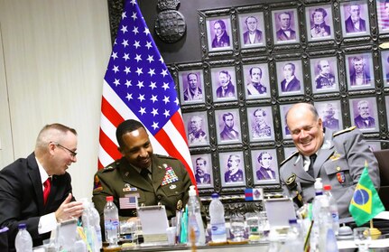 Maj. Gen. William Thigpen (left), Army South commanding general, and Gen. Freire Gomes, Brazilian Army commanding general, share a laugh during a bilateral engagement at the Conference of Americas Armies in Brasilia, Brazil April 20. Brazil was the host nation for the 35th Cycle of the CAA.