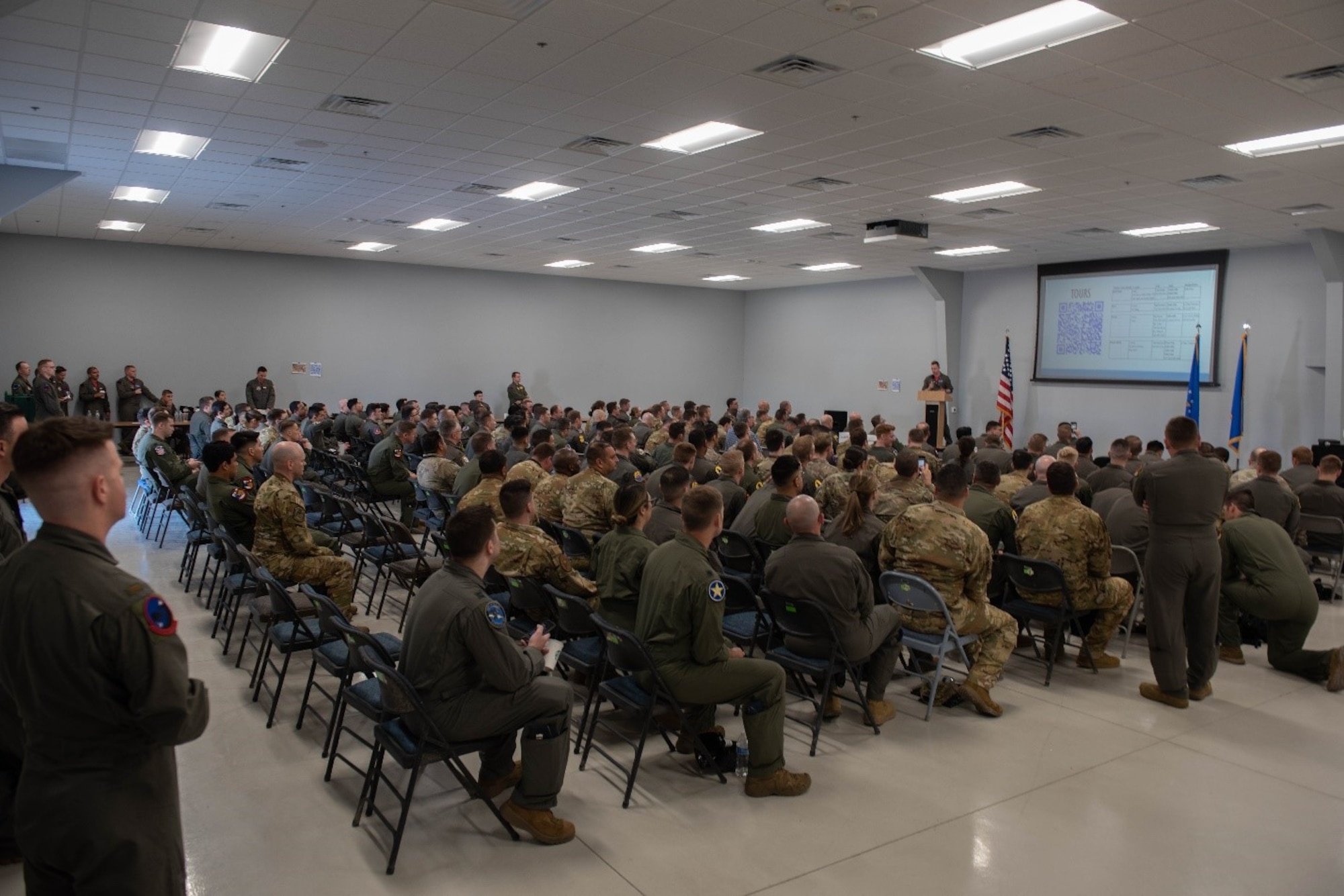 Airmen sit and listen to the opening comments at Reaper Smoke 2022.