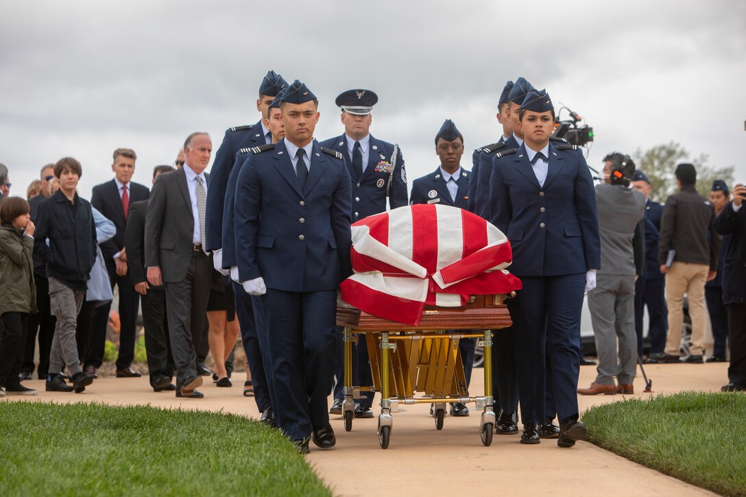 The March Air Force Base Honor Guard lays retired Air Force Brig. Gen. Robert Cardenas to rest at the Miramar National Cemetery, San Diego, California, March 31, 2022. Cardenas was born March 10, 1920, and passed away March 10, 2022. (U.S. Marine Corps photo by Cpl Raynaldo Ramos)