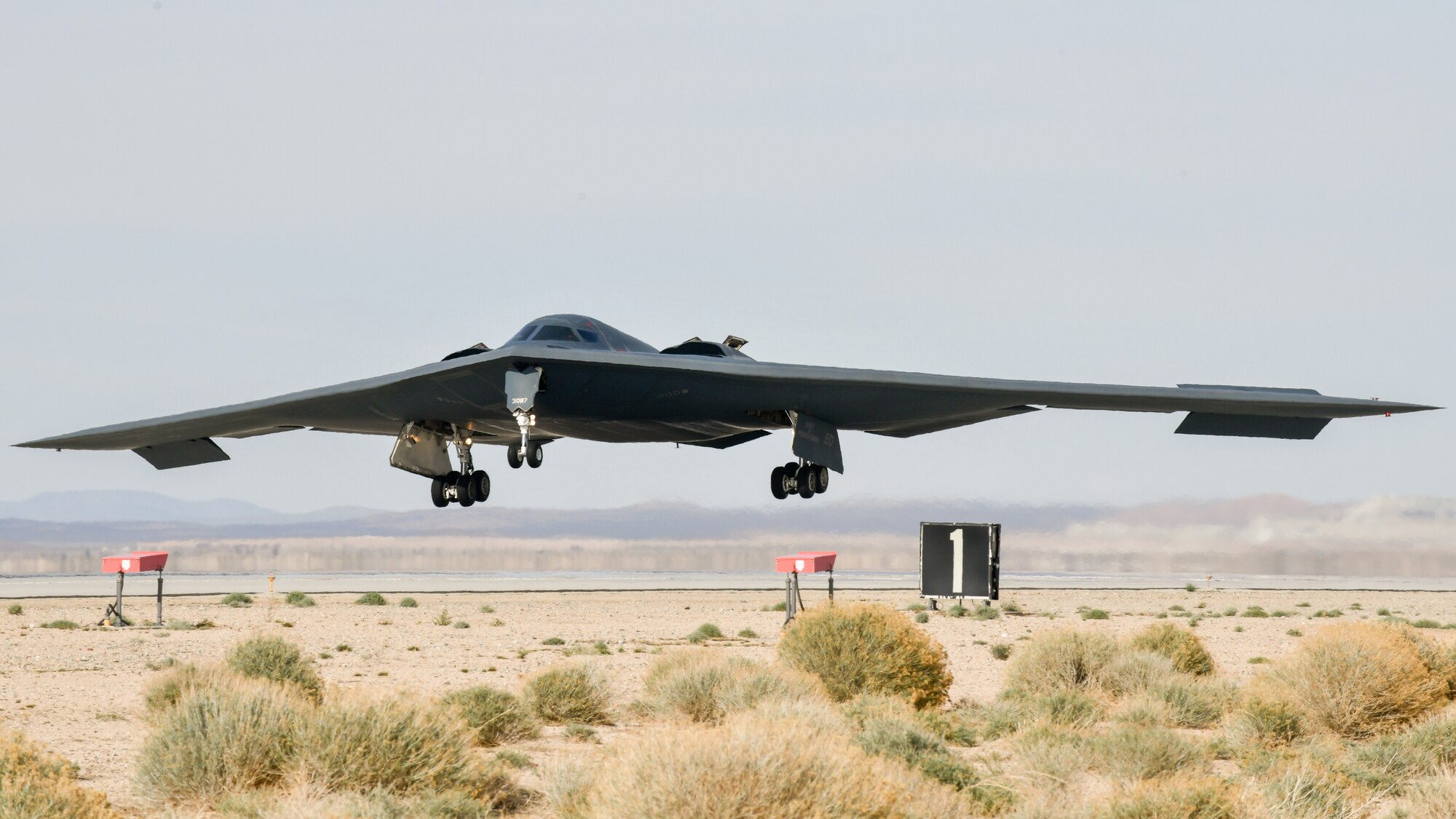 A B-2 Spirit, the Spirit of Pennsylvania, from the 419th Flight Test Squadron, returns to Edwards Air Force Base, California, after conducting a flyover during funeral services for the late Brig. Gen. Robert “Bob” Cardenas, March 31. (Air Force photo by Chase Kohler)
