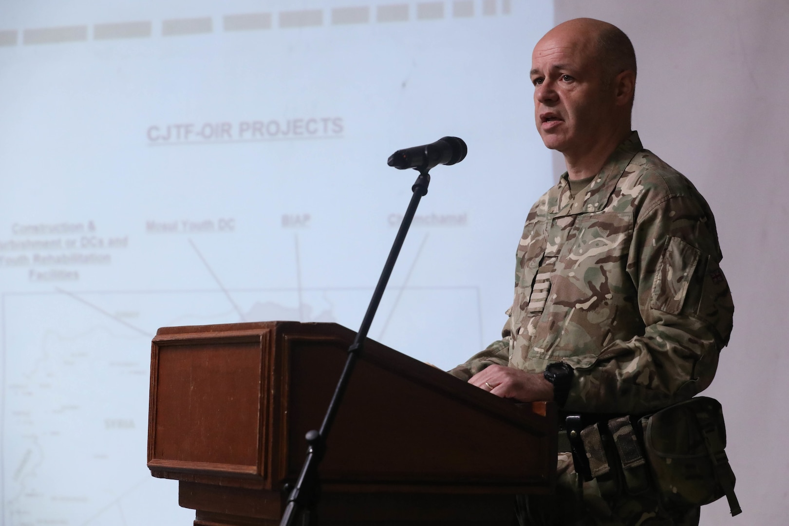 British Gp. Capt. Rob O’Dell, North East Syria Coordination Group director, gives a speech during the Ambassadors Day event at Union III forward operating base in Baghdad, Iraq, April 21, 2022. During the CJTF-OIR-hosted event, representatives from more than 25 Coalition countries discussed the CJTF-OIR mission and broad efforts to tackle enduring regional security and stability challenges. (U.S. Army photo by Staff Sgt. Bree-Ann Ramos-Clifton)