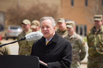 Sen. Dick Durbin speaking from podium outside