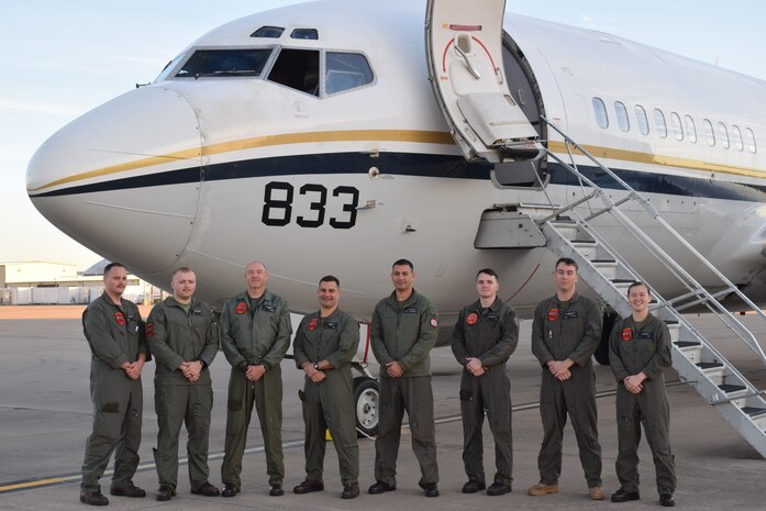 U.S. Marine Corps Staff Sgt. Song, right, a C-40A Clipper crew chief with Marine Transport Squadron 1, Marine Aircraft Group 41, Marine Forces Reserve, poses with other Marines with VMR-1 after the first C-40A Clipper mission conducted by solely by Marines at Naval Air Station Joint Reserve Base Fort Worth, Texas.