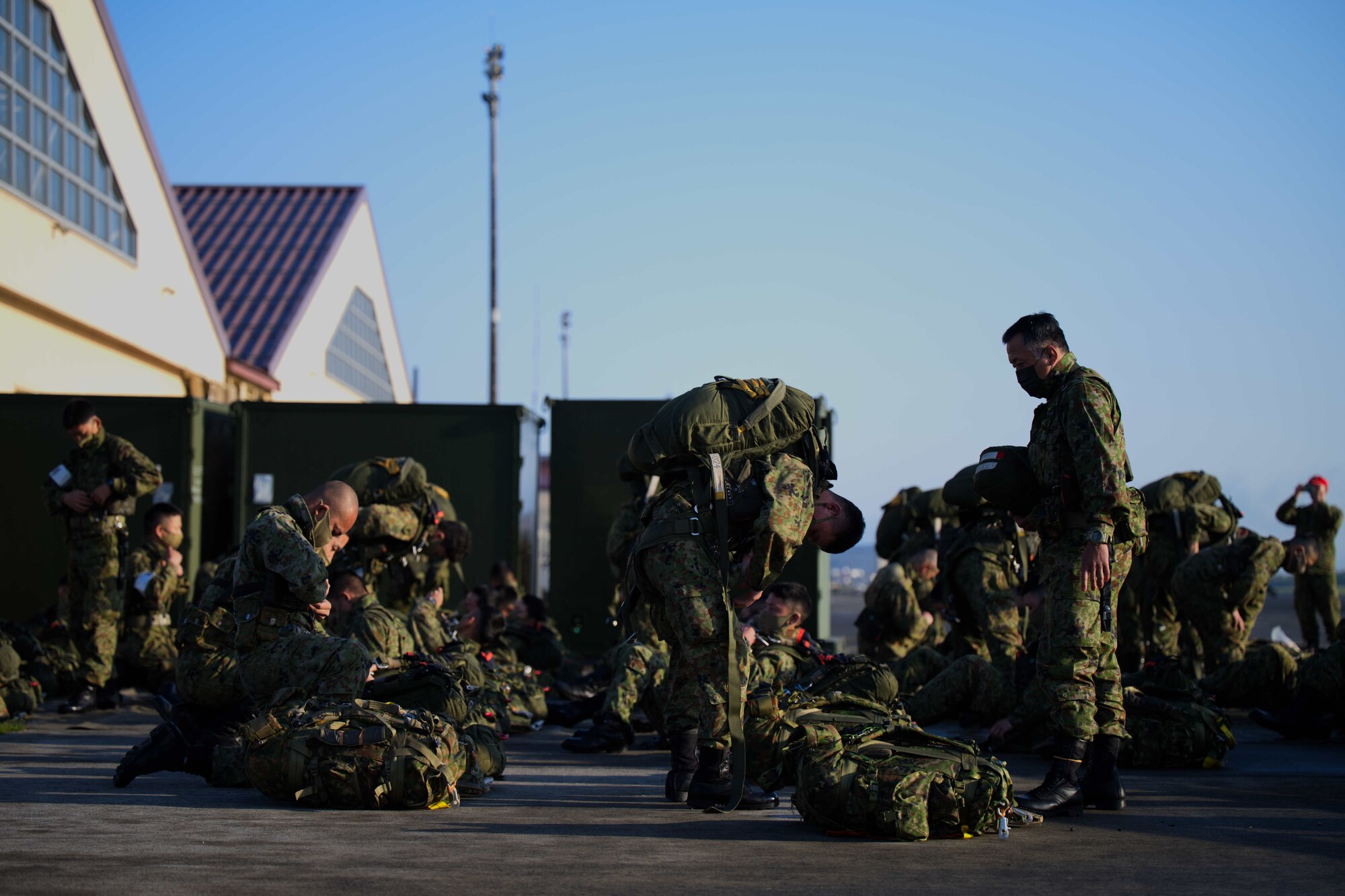 JGSDF members don static line jump equipment.