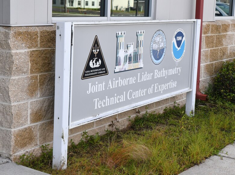 The Joint Airborne Lidar Bathymetry Technical Center of Expertise stands ready to conduct its joint mission at Stennis International Airport, Mississippi, on April 18, 2022. The center is comprised of engineers and scientists from the Mobile District, the Corps Engineer, Research and Development Center, the Naval Oceanographic Office, the National Oceanic and Atmospheric Administration’s National Geodetic Survey, and the U.S. Geological Survey. (USACE photo by Chuck Walker)