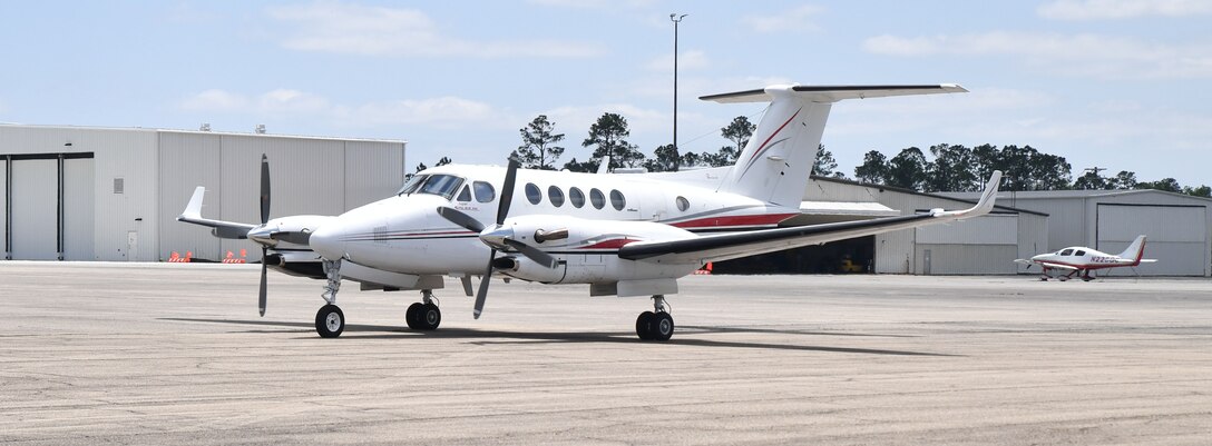A Beechcraft Super King 300 taxis on the runaway after completing a calibration flight for the Joint Airborne Lidar Bathymetry Technical Center of Expertise (JALBTCX) at Stennis International Airport, Mississippi, on April 18, 2022. The aircraft is equipped with two lidar sensors and two high resolution cameras that help gather the necessary data and imagery for JALBTCX’s mapping program. (USACE photo by Chuck Walker)