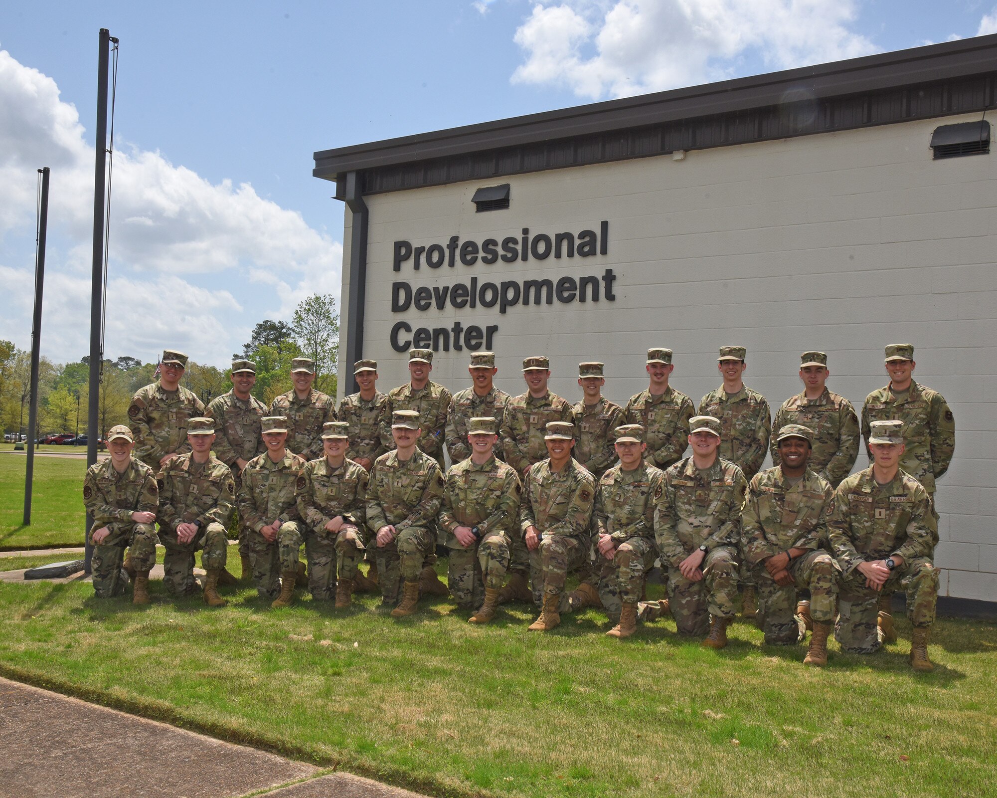 Students from the Officer Immersion Course pose for a group photo, April 14, 2022 on Columbus Air Force Base, Miss. The course was made so that officers arriving to Columbus AFB, as their first duty station, could learn about important programs available to them and further build professional development skills. (U.S. Air Force photo by Elizabeth Owens)