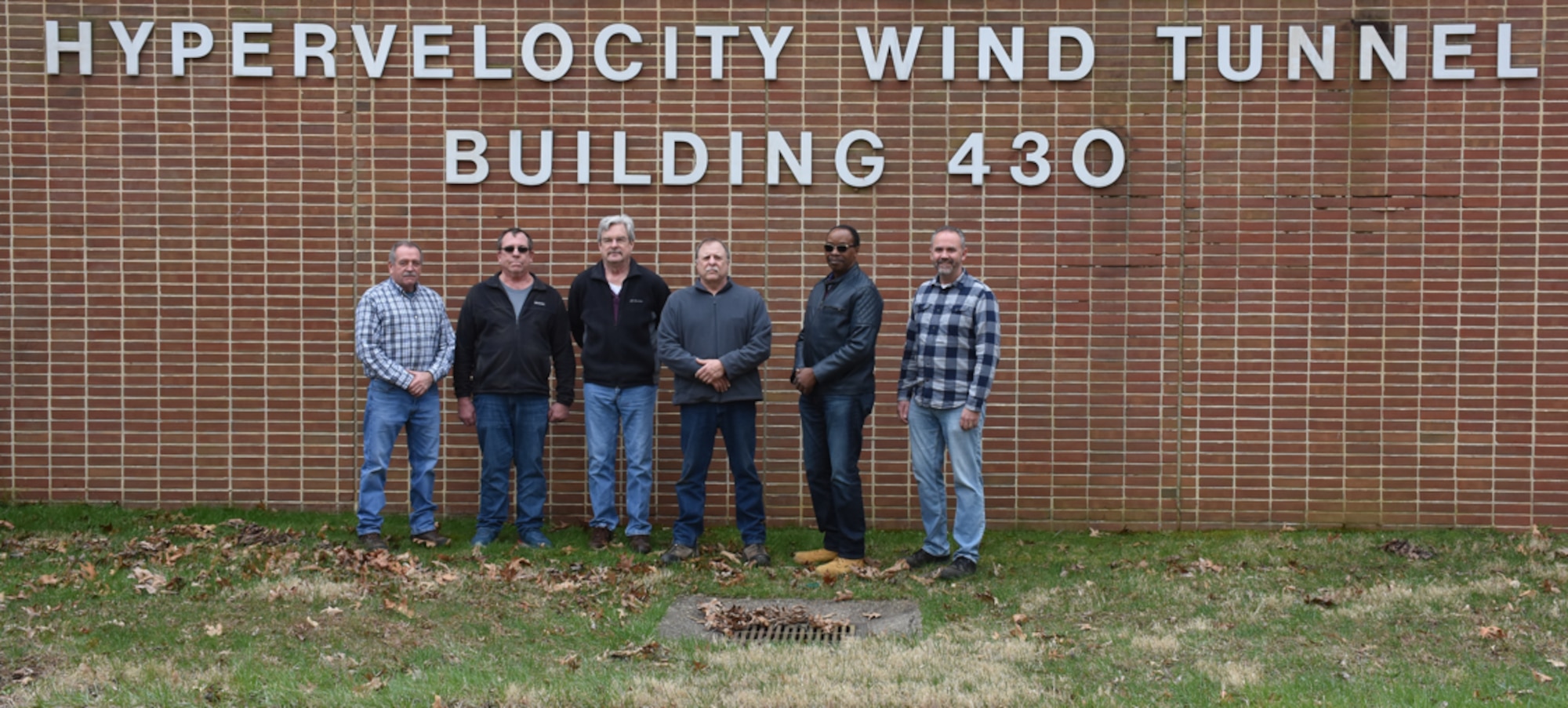 The White Oak Rescue Team (WORT) was established in the late 1990s at Arnold Engineering Development Complex Hypervelocity Wind Tunnel 9 in White Oak, Maryland, to provide immediate lifesaving actions in the event of an emergency until county emergency responders arrive onsite. Pictured are members of the original WORT who are still employed at Tunnel 9. From left are Terry Mullin, William Betz, Raymond Schlegel, Chester DiBenedetto, Arnold Collier and AEDC White Oak Site Director Joe Coblish. (U.S. Air Force photo by Addison Spicer)
