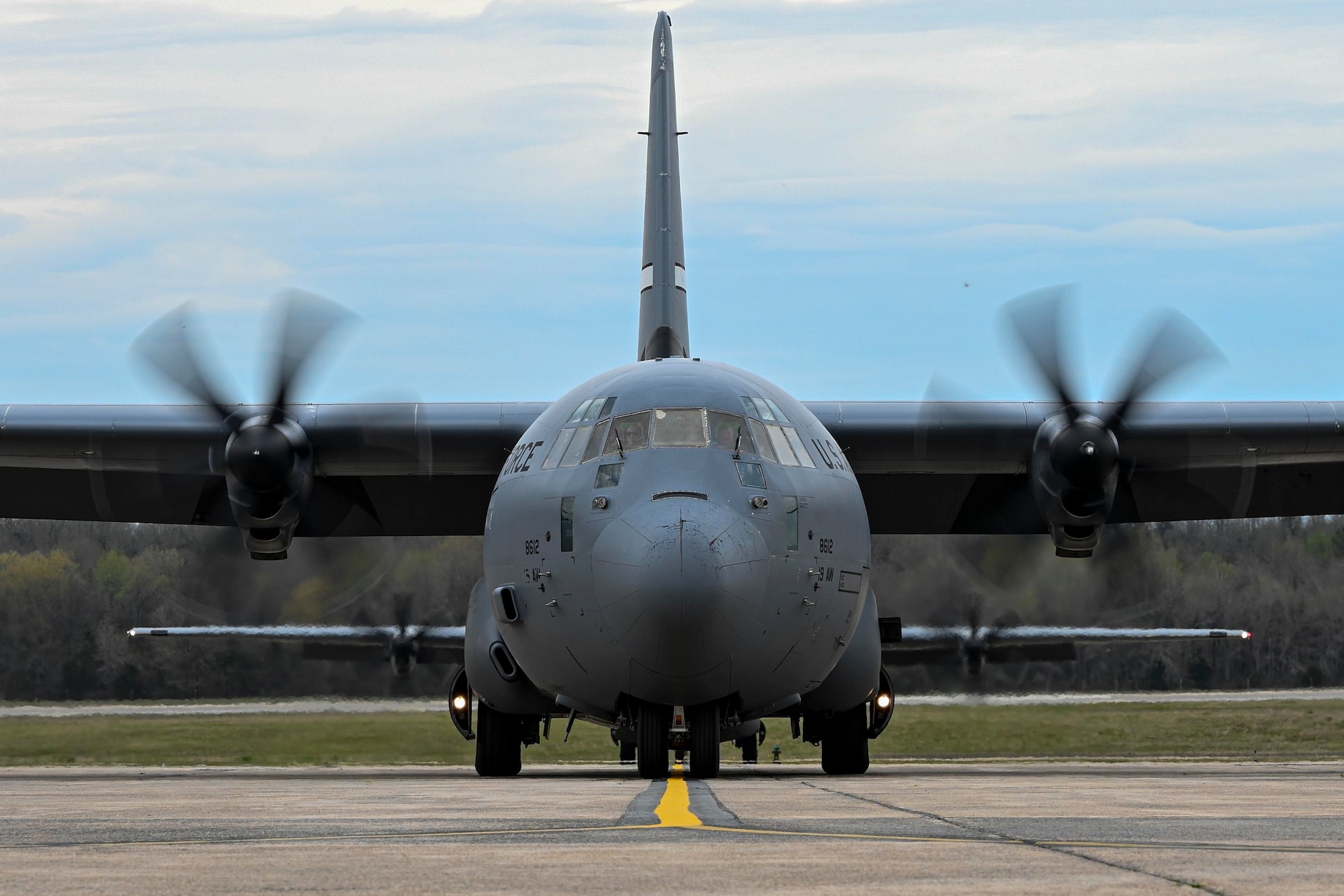 A C-130J Super Hercules taxis on the flightline at Little Rock Air Force Base, Arkansas, as Airmen from the 19th Airlift Wing return from a deployment, April 4, 2022. Airmen from the 19th AW deployed to Ali Al Salem Air Base, Kuwait, which is known as U.S. Central Command’s Theater Gateway, and is capable of responding to contingencies throughout the area of responsibility through tactical airlift operations. (U.S. Air Force photo by Airman 1st Class Maria Umanzor Guzman)