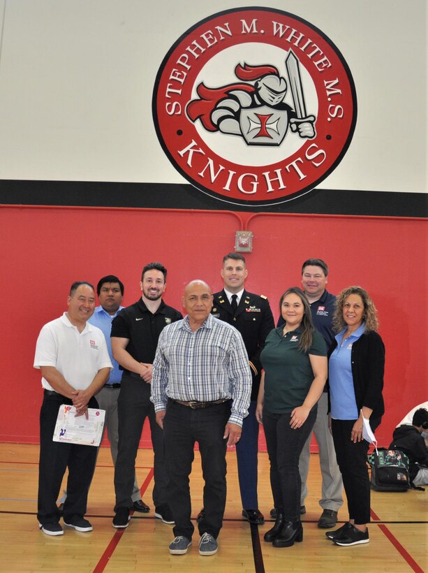 The Army Corps of Engineers Los Angeles District volunteers pose for a photo at Stephen White Middle School, March 25, 2022, in Carson, California.