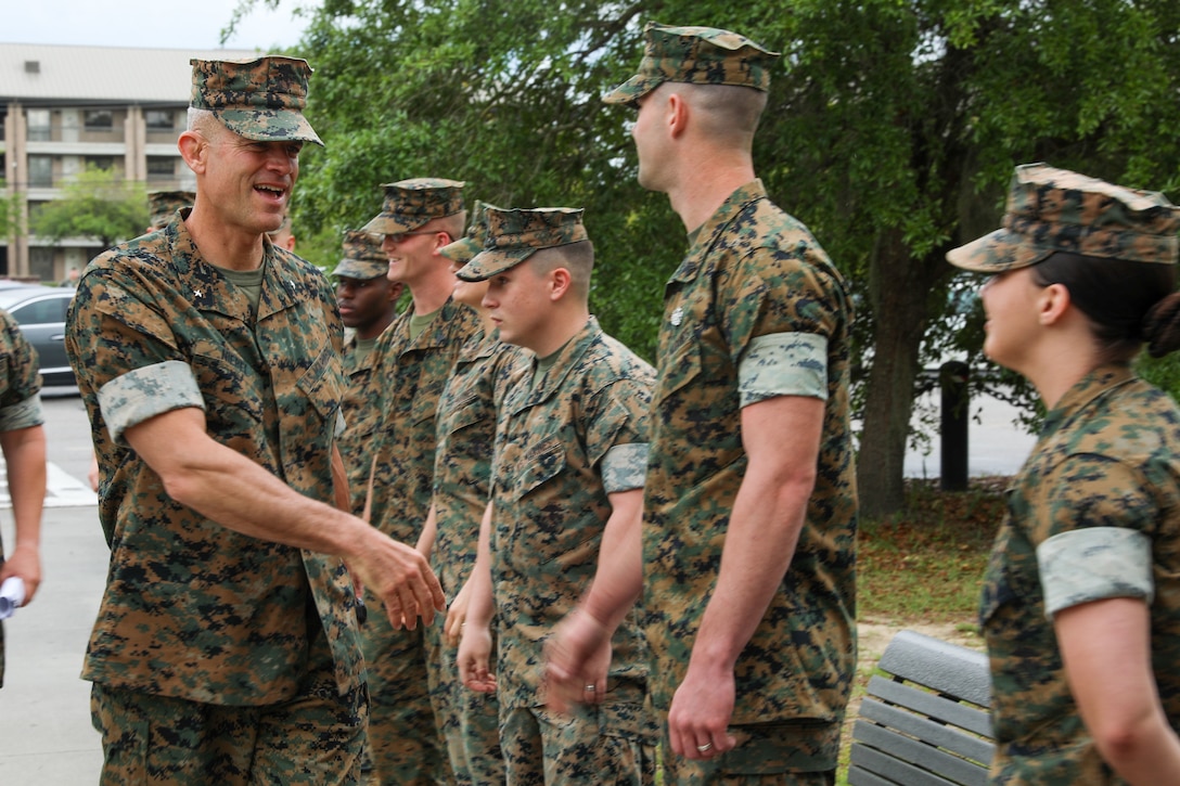 U.S. Marine Corps Brig. Gen. Andrew Niebel, commanding general, Marine Corps Installations East, greets Marines with Headquarters and Headquarters Squadron, Marine Corps Air Station (MCAS) Beaufort, at the mess hall on MCAS Beaufort, South Carolina, April 18, 2022. Niebel met with Marines to talk about their daily operations and discuss the future of the Marine Corps. (U.S. Marine Corps photo by Sgt. Cheyeanne Campbell)