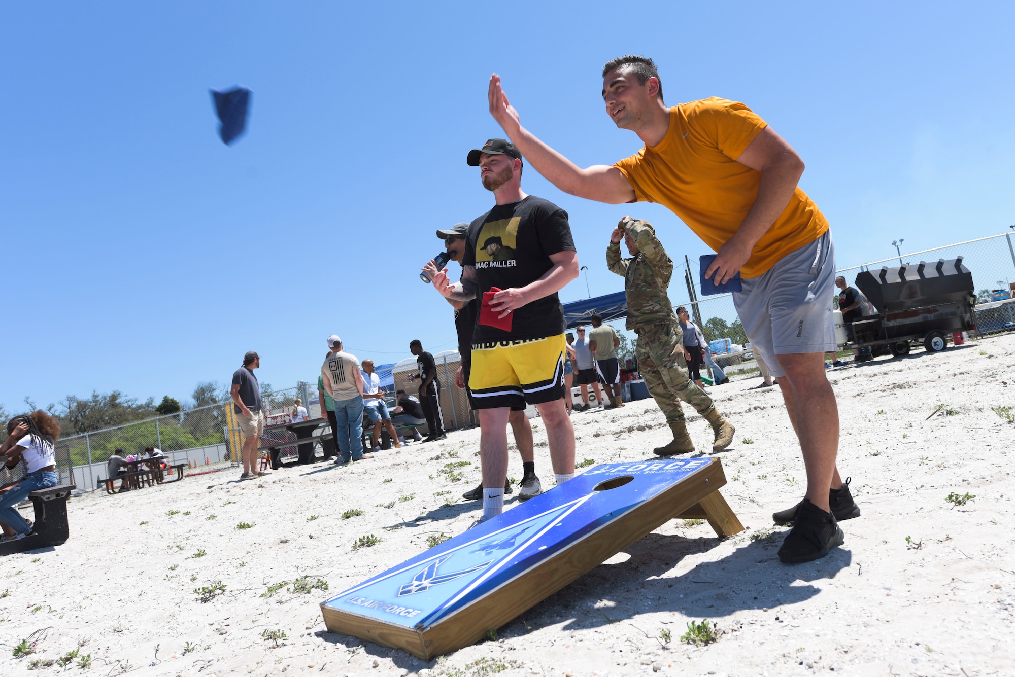 Airmen play cornhole