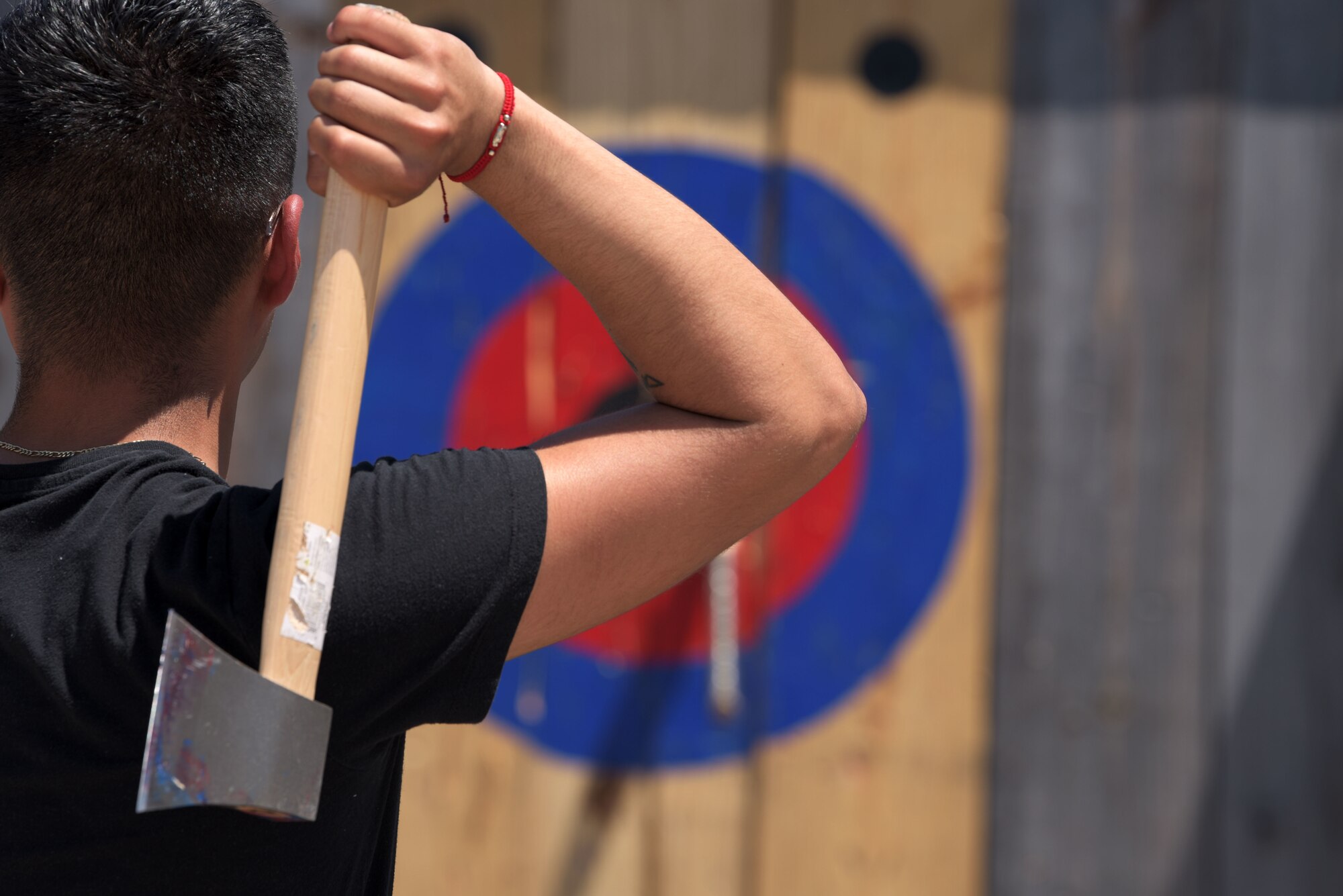 Airman throws axe