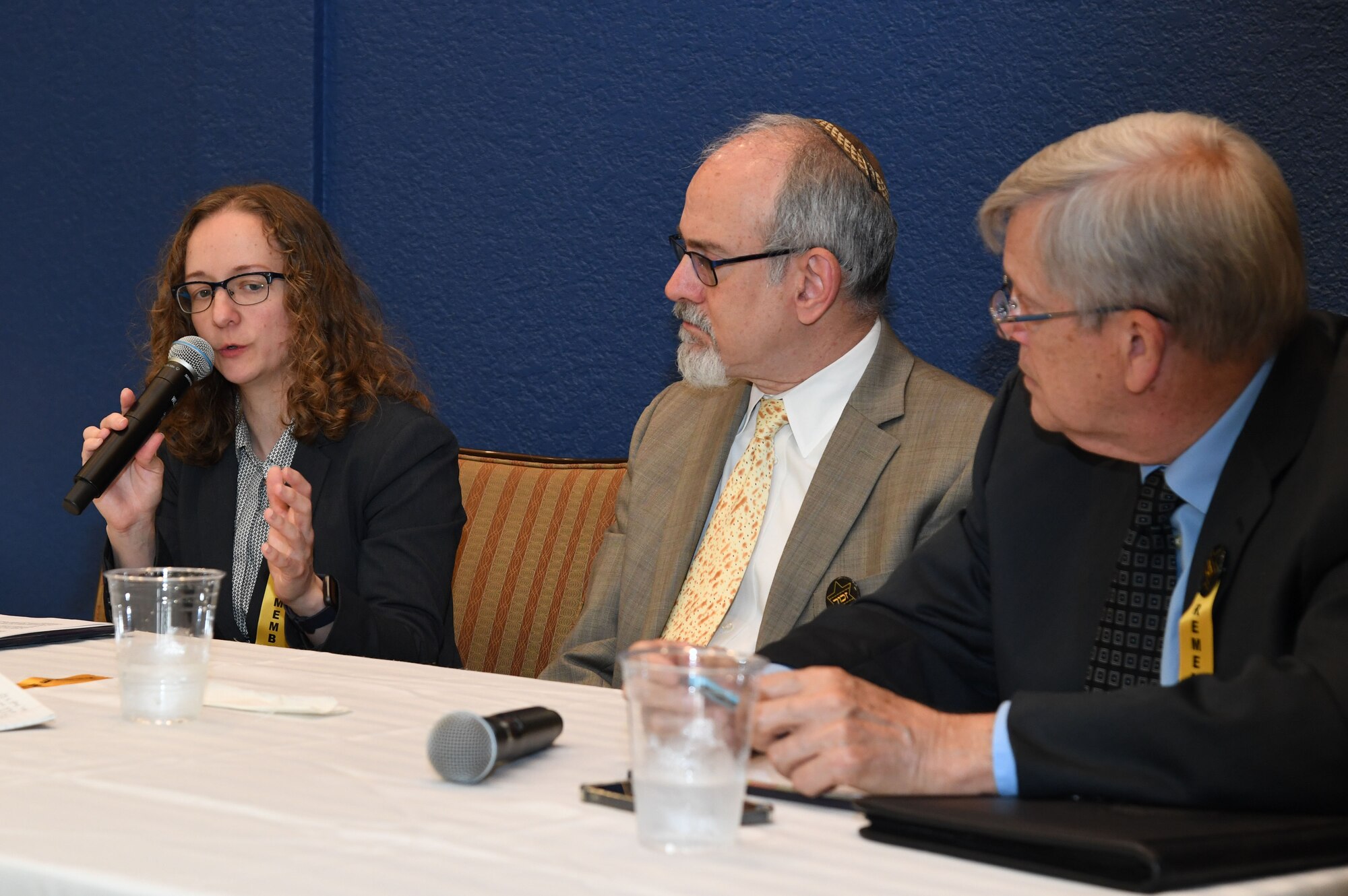 Dr. Alexandria Ruble, Spring Hill College European History assistant professor, participates in a panel discussion during a Holocaust Remembrance Days of Remembrance event inside the Bay Breeze Event Center at Keesler Air Force Base, Mississippi, April 20, 2022. The event was held in memory of the six million Jewish victims of the Holocaust. The panel members shared their experiences and educational information.  (U.S. Air Force photo by Kemberly Groue)