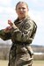 U.S. Army ROTC Cadet Elizabeth Ann Burke begins to rappel down a tower while participating in leadership training along with other students during a joint field training exercise at Fort Indiantown Gap, April 8, 2022. Burke is a freshman at Penn State University and native of Reston, Virginia. (U.S. Army National Guard photo by Spc. Annie M. Riley)