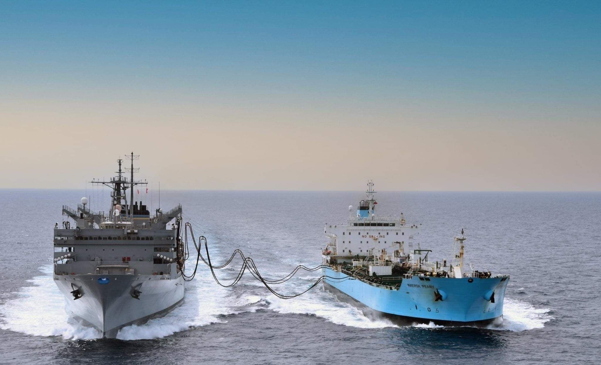 The Military Sealift Command Fast Combat Support Ship USNS Supply (T-AOE 6) and commercial tanker MT Maersk Peary conduct the first two-station consolidated cargo replenishment at sea (CONSOL).