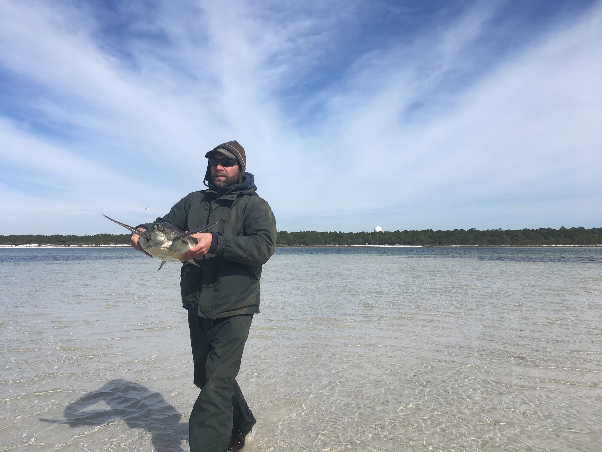 Man holding a turtle