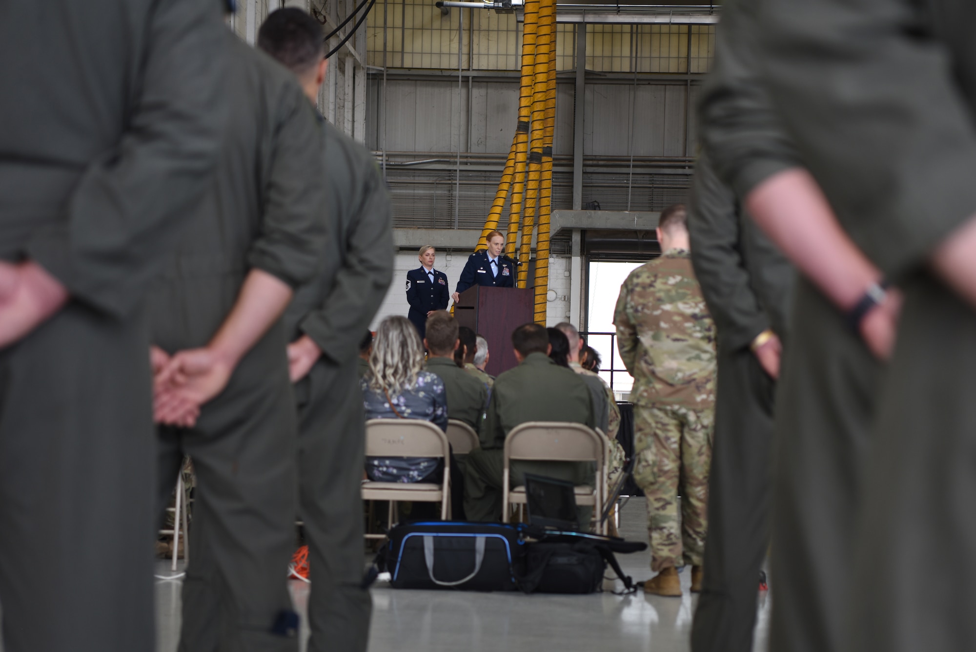 U.S. Air Force Lt. Col. Kristen Jenkins, 28th Bomb Squadron commander, delivers remarks after assuming command of the squadron during the 28th BS change of command ceremony inside the Three Bay Hangar at Dyess Air Force Base, Texas, April 22, 2022. Jenkins assumed command of the 28th BS which provides all B-1 initial qualification and instructor upgrade training. (U.S. Air Force photo by Staff Sgt. Holly Cook)