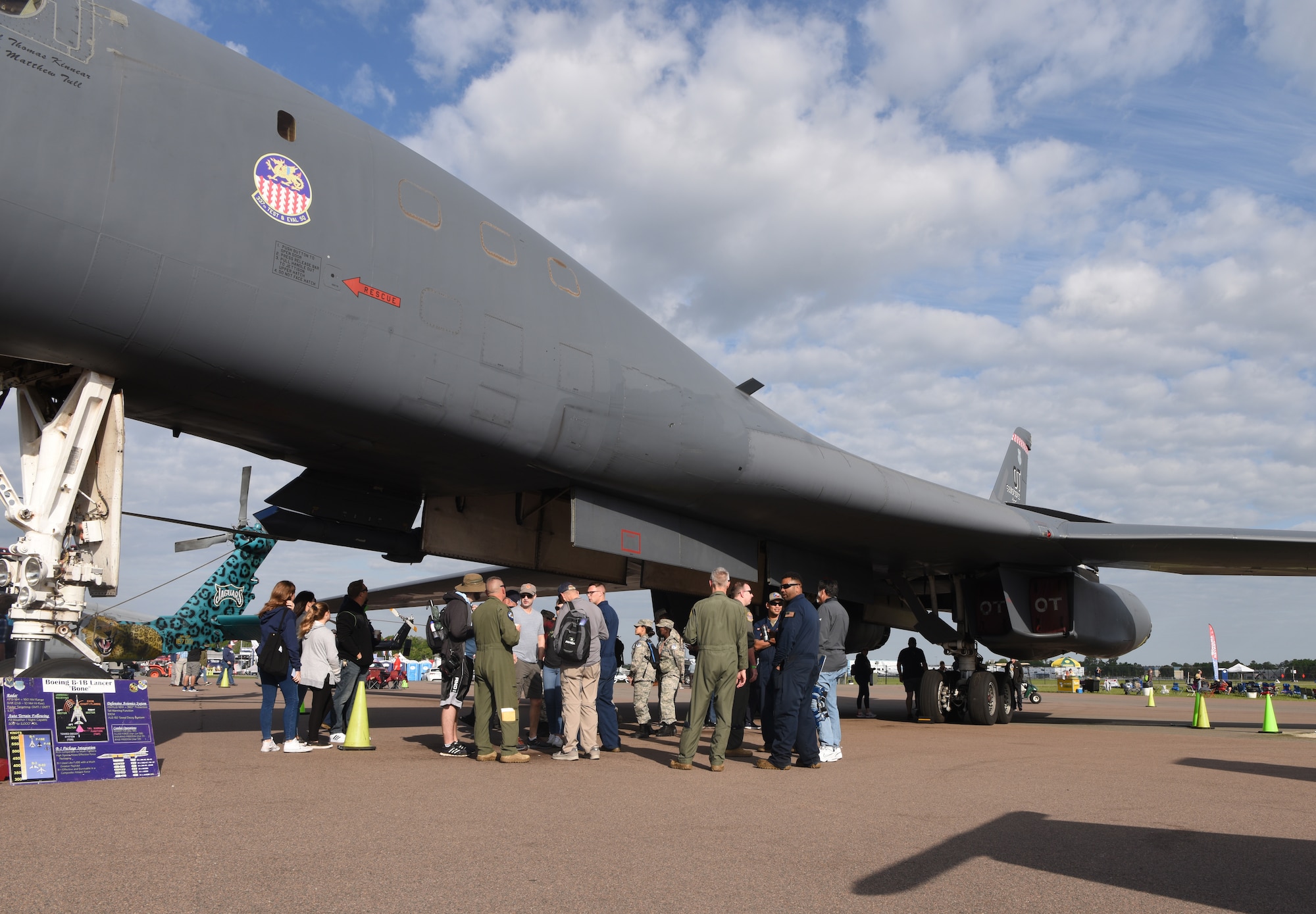 Members of the 337th Test and Evaluation Squadron speak to Sun ‘n Fun Aerospace Expo attendees at the Lakeland Linder International Airport in Lakeland, Florida, April 9, 2022. The expo started in 1974 as a fly-in for sport aviation enthusiasts and now has grown to one of the largest air shows in the world. As part of its anniversary, the expo highlighted the B-1B Lancer as one of its top static displays. (U.S. Air Force photo by Staff Sgt. Holly Cook)