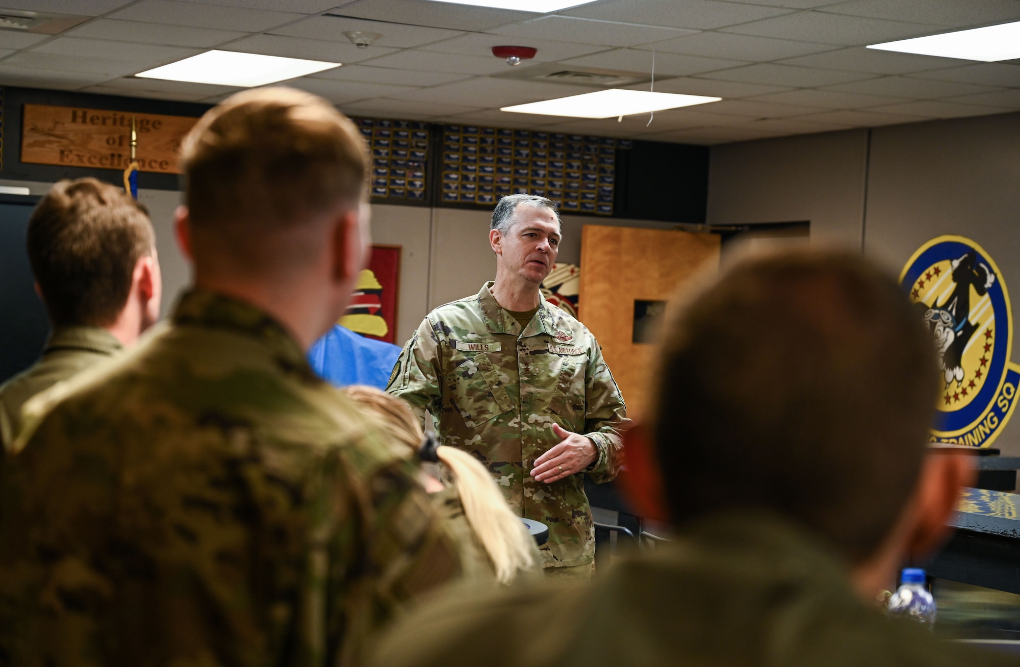 Maj. Gen. Craig D. Wills is Commander, 19th Air Force commander, speaks with members of the 48th Flying Training Squadron on April 20, 2022, at Columbus Air Force Base, Miss. Wills is responsible for and oversees more than 45% of the Air Force’s annual flying hour program that trains more than 32,000 U.S. and allied aircrew annually flying 29 different types of aircraft. (U.S. Air Force photo by Senior Airman Davis Donaldson)