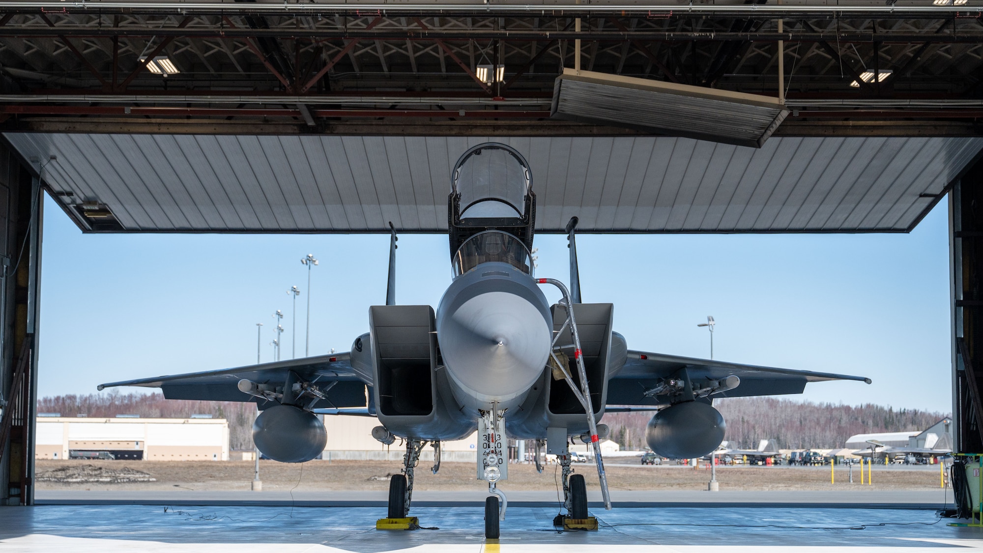A photo of an F-15 Eagle sitting in a hangar.