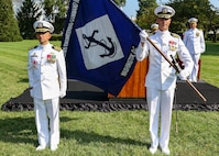 Photo of Capt. Eric J. Hawn (right) relieved Capt. Gregory G. Vinci (left) during a change of command ceremony