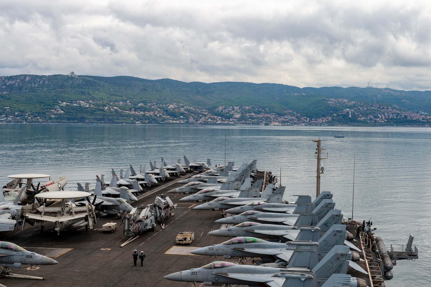 The Nimitz-class aircraft carrier USS Harry S. Truman (CVN 75) pulls into Trieste, Italy, April 23, 2022.