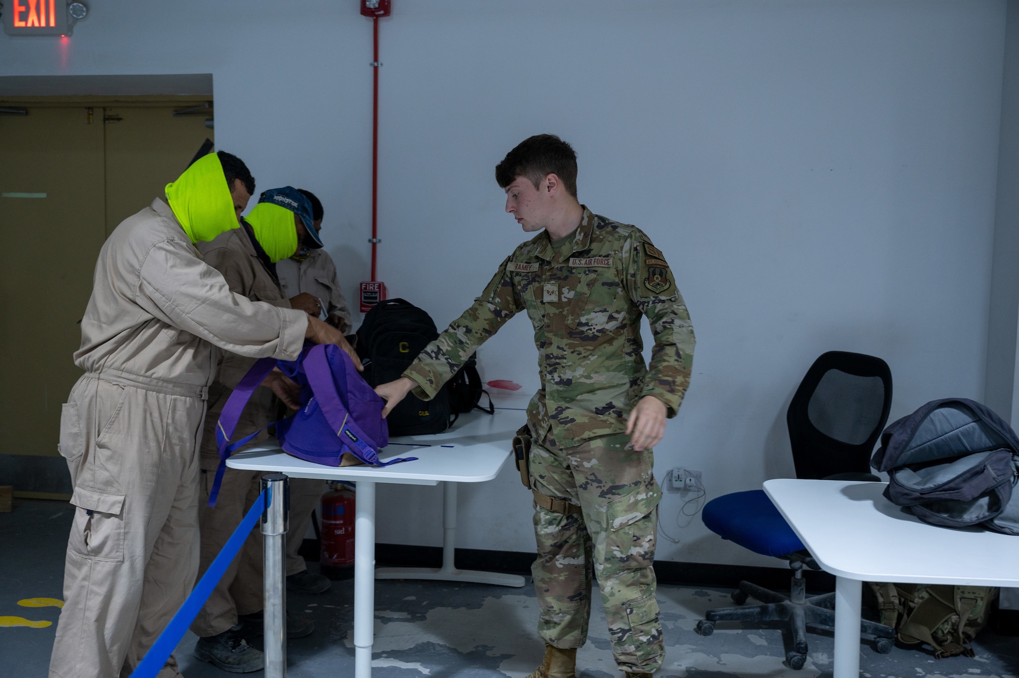 As a first line of defense, entry controllers from the 386th Expeditionary Security Forces Squadron screen the belongings of approximately 550 to 650 other country nationals on a daily basis.